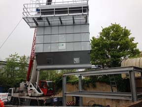 The entire system is lifted onto the steel structure and bolted together.